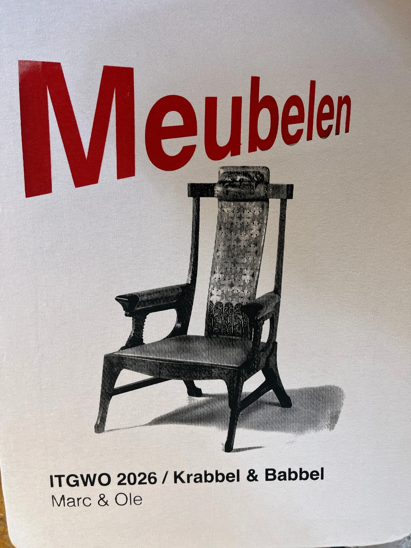 Red Meubelen lettering and black halftone chair printed on light-coloured textile